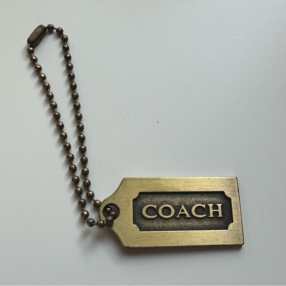 Coach Mini Metal Key Chain Tag
Condition: Gently Used